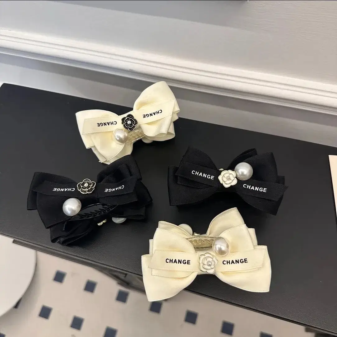 French Style Black Bow Hairpin with Pearl Accents — feature 1