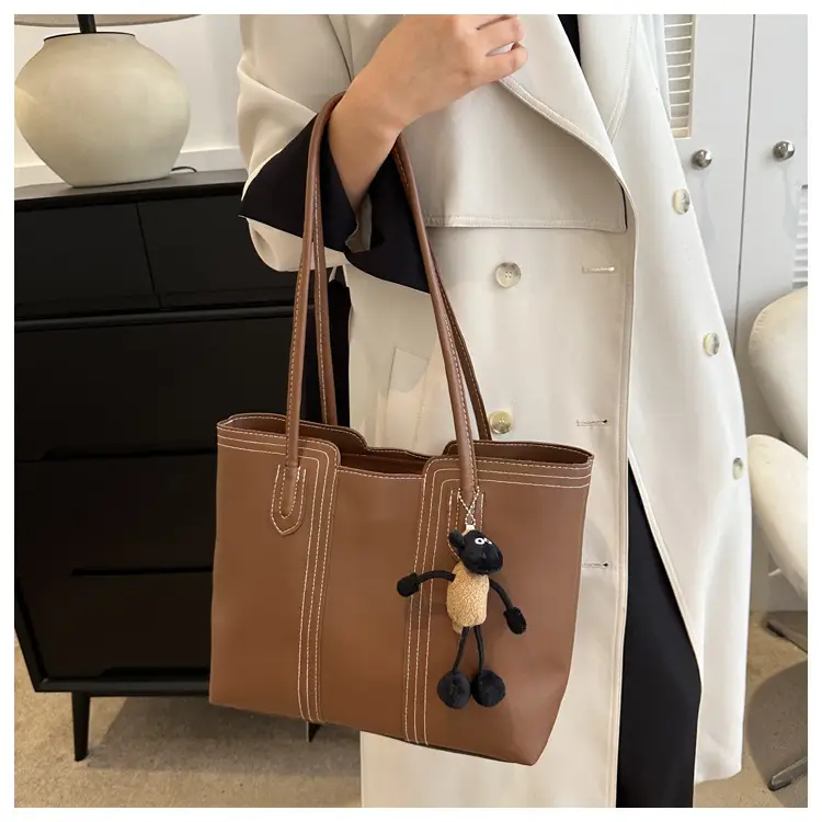 Large Capacity Women's Tan Shoulder Bag with Retro Charm — feature 12