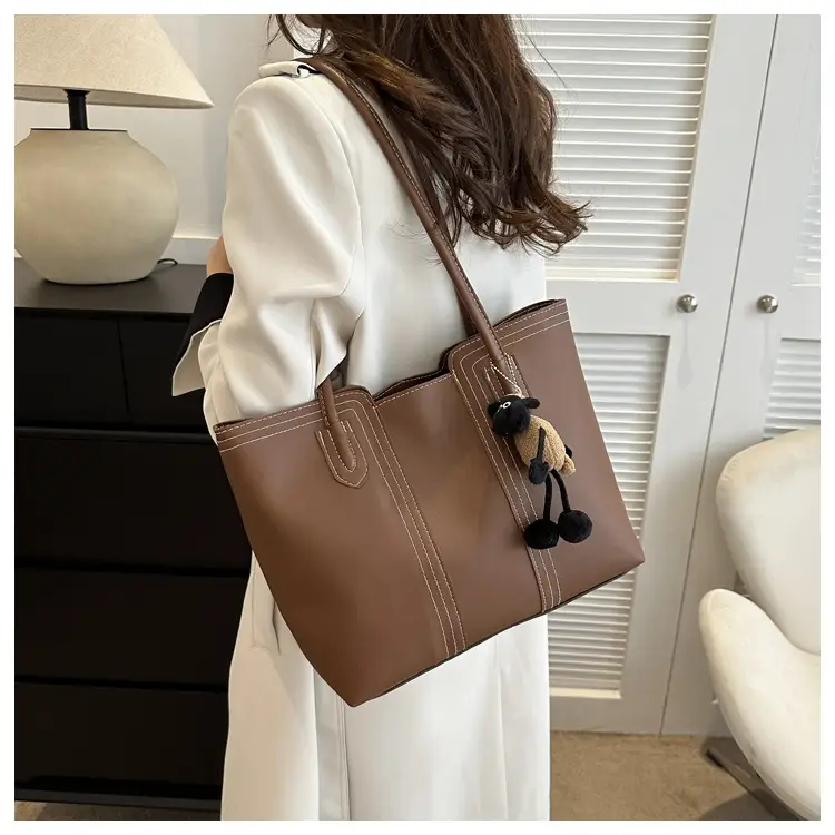 Large Capacity Women's Tan Shoulder Bag with Retro Charm — feature 13