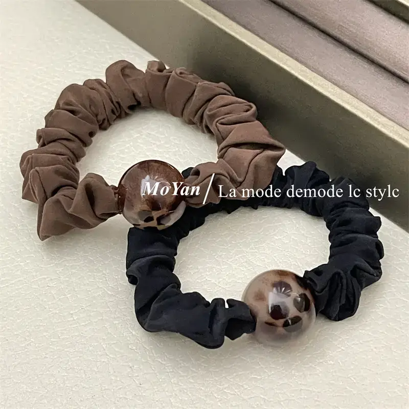 Leopard Print Rubber Hair Band with Ball Accent — feature 1