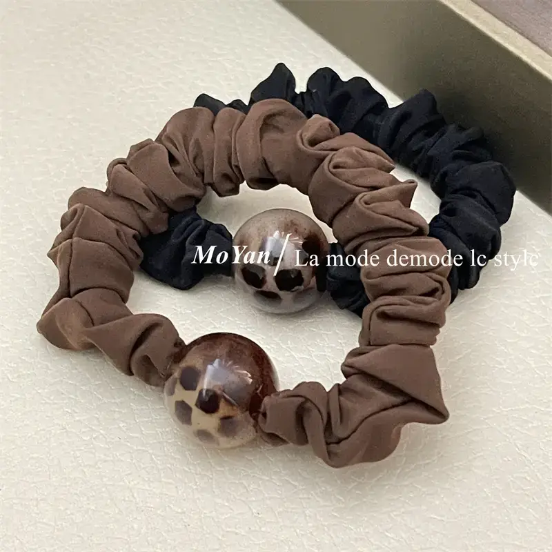Leopard Print Rubber Hair Band with Ball Accent — feature 2