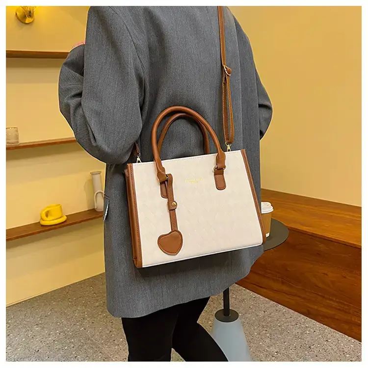 Women's Small Quilted Shoulder Bag with Brown Handles — feature 10