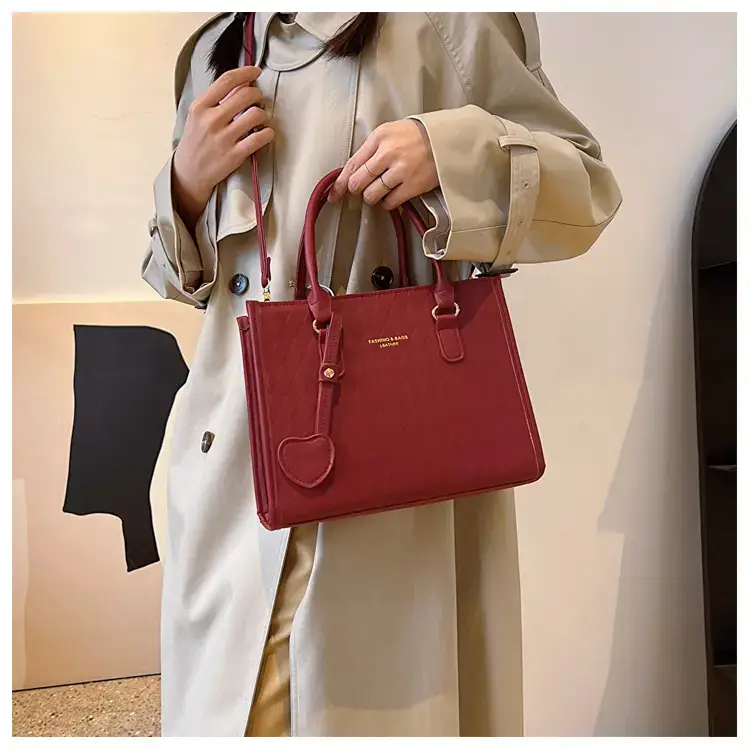 Women's Small Quilted Shoulder Bag with Brown Handles — feature 18