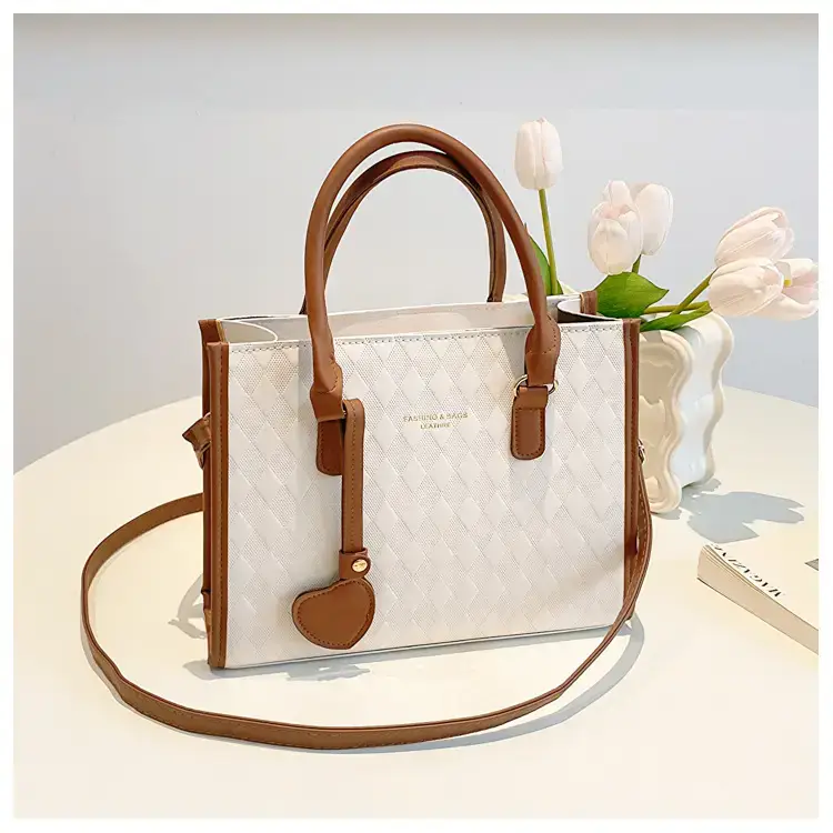 Women's Small Quilted Shoulder Bag with Brown Handles — feature 22