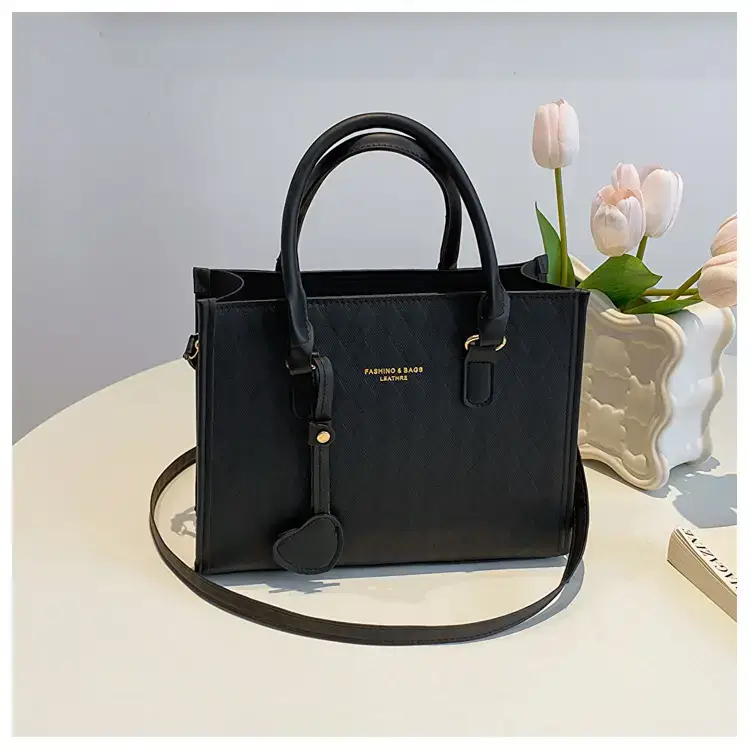 Women's Small Quilted Shoulder Bag with Brown Handles — feature 23