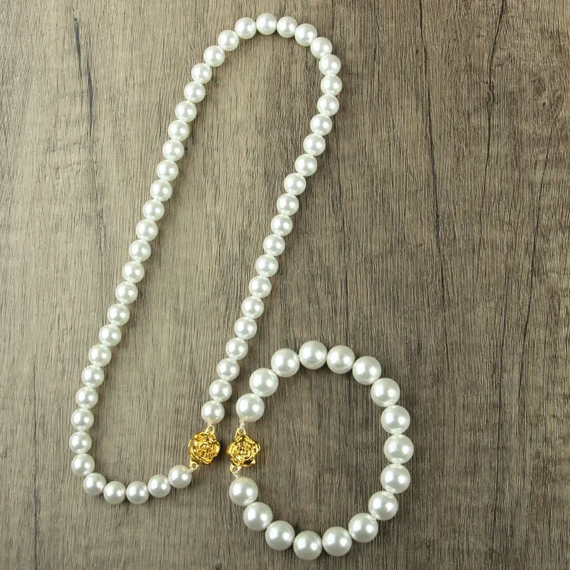Pearl Beaded Clasp Necklace with Gold Flower Centerpiece — feature 16