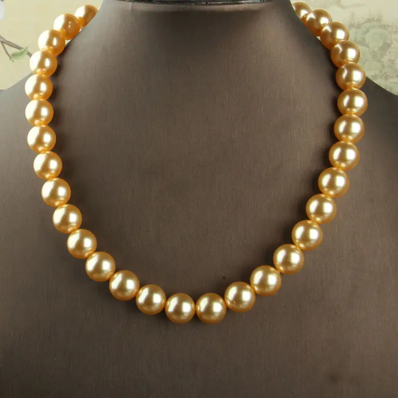 Pearl Beaded Clasp Necklace with Gold Flower Centerpiece — feature 6