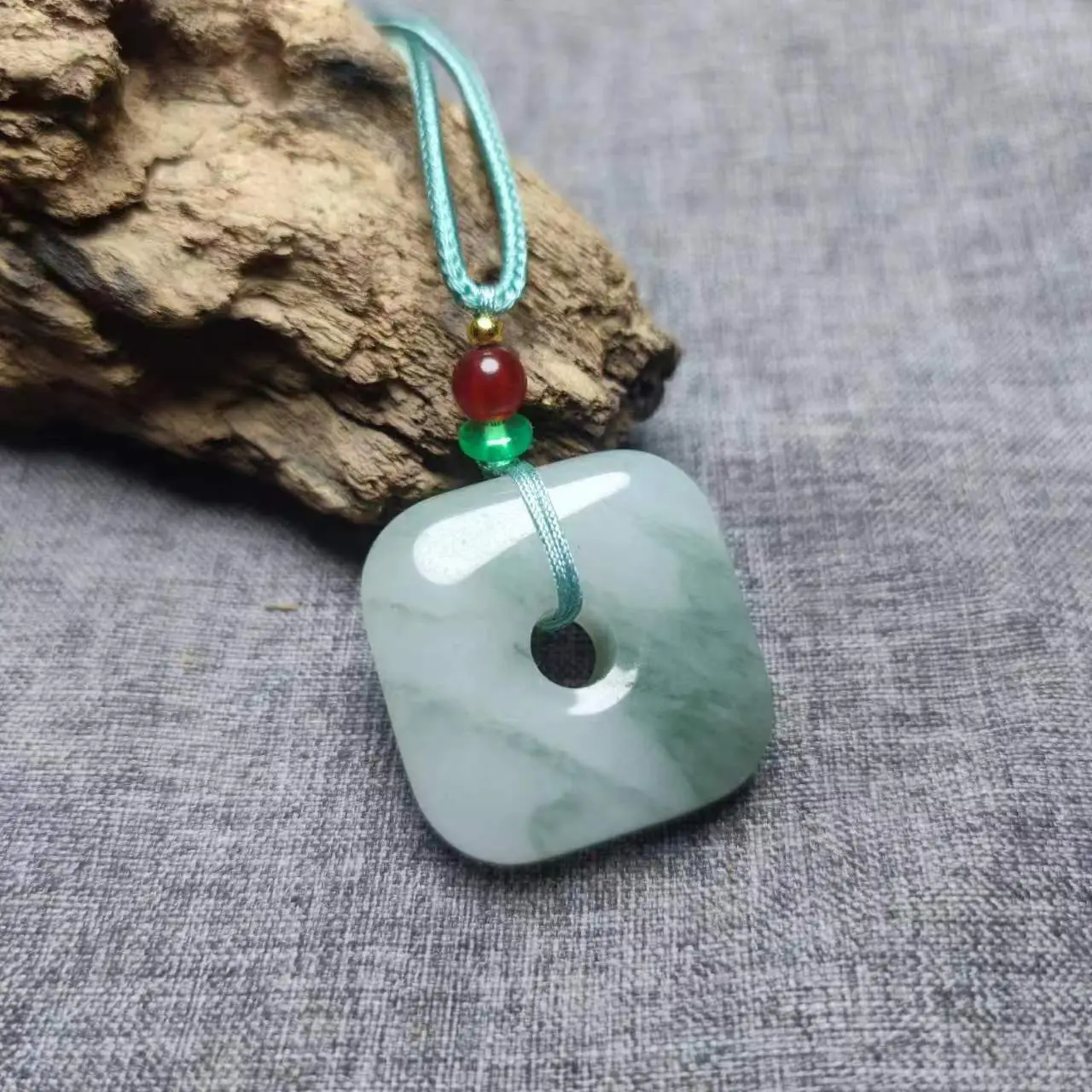 Natural Xinjiang Jade Ping An Ring Pendant with Red & Green Accents - Image 7