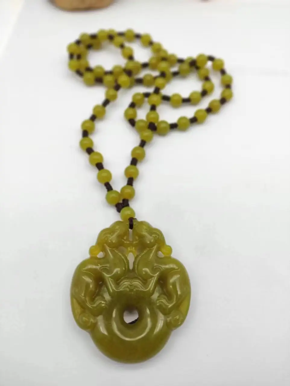 Xiu Jade Peace Pendant with Pixiu Design — feature 2