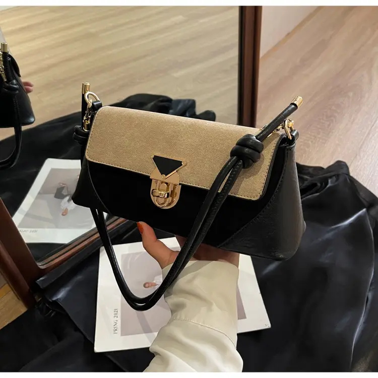 Women's Black Leather Shoulder Bag with Gold Clasp — feature 24