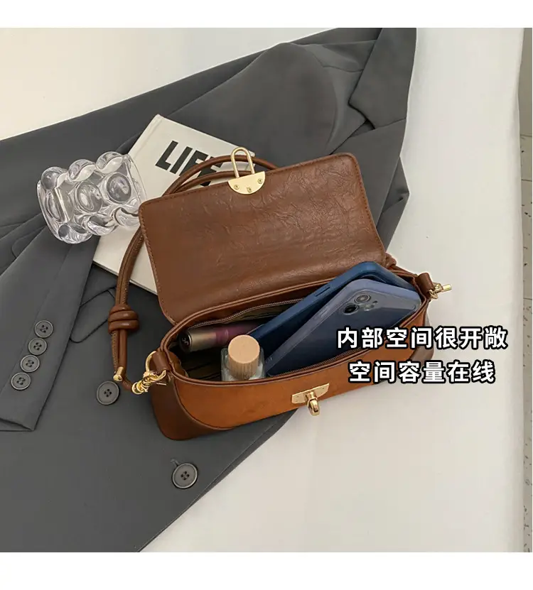 Women's Black Leather Shoulder Bag with Gold Clasp — feature 9