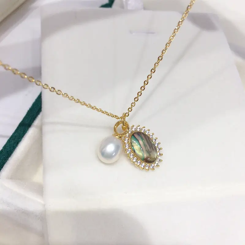 Zhuji Yuan Natural Pearl Pendant with Abalone Shell — feature 7