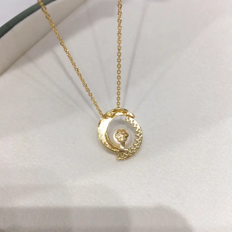 K Gold Pearl Necklace with Fritillaria Star Moon Design — feature 9