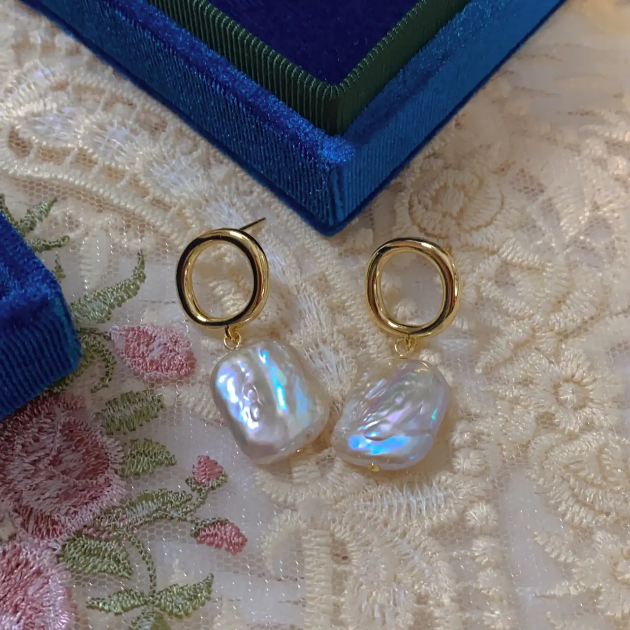 Silver Pearl Earrings with Gold Ring Top — feature 1
