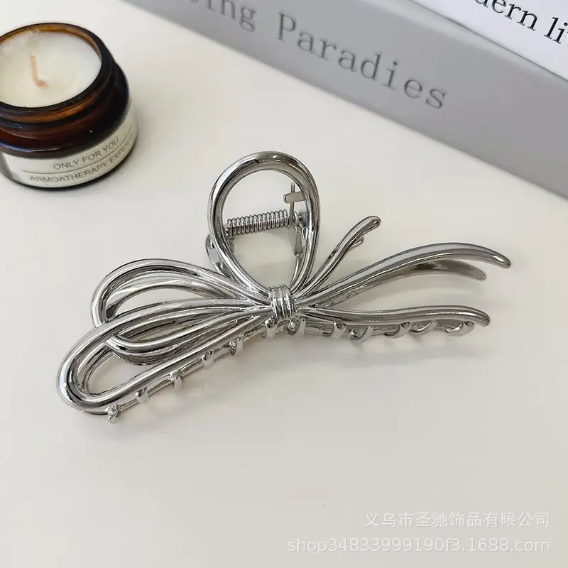 Glossy Silver Butterfly Hair Clips for Updos - Image 5