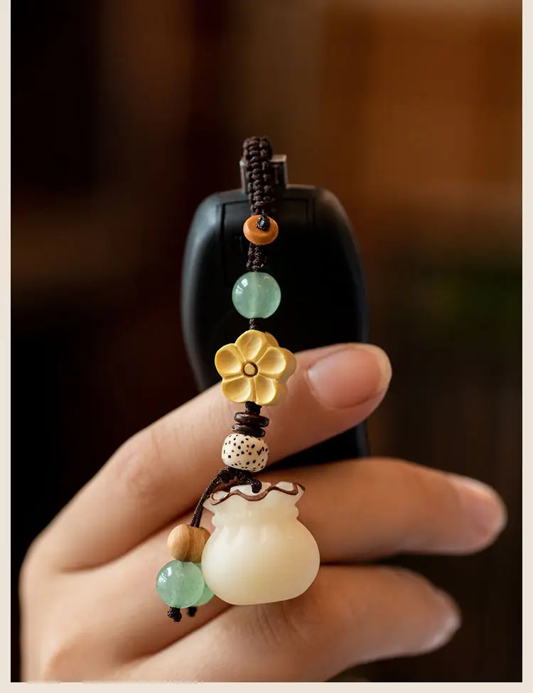 Creative handmade Bodhi money bag mobile phone chain pendant couple high-end car keychain Lucky Bag bag hanging jewelry — feature 18
