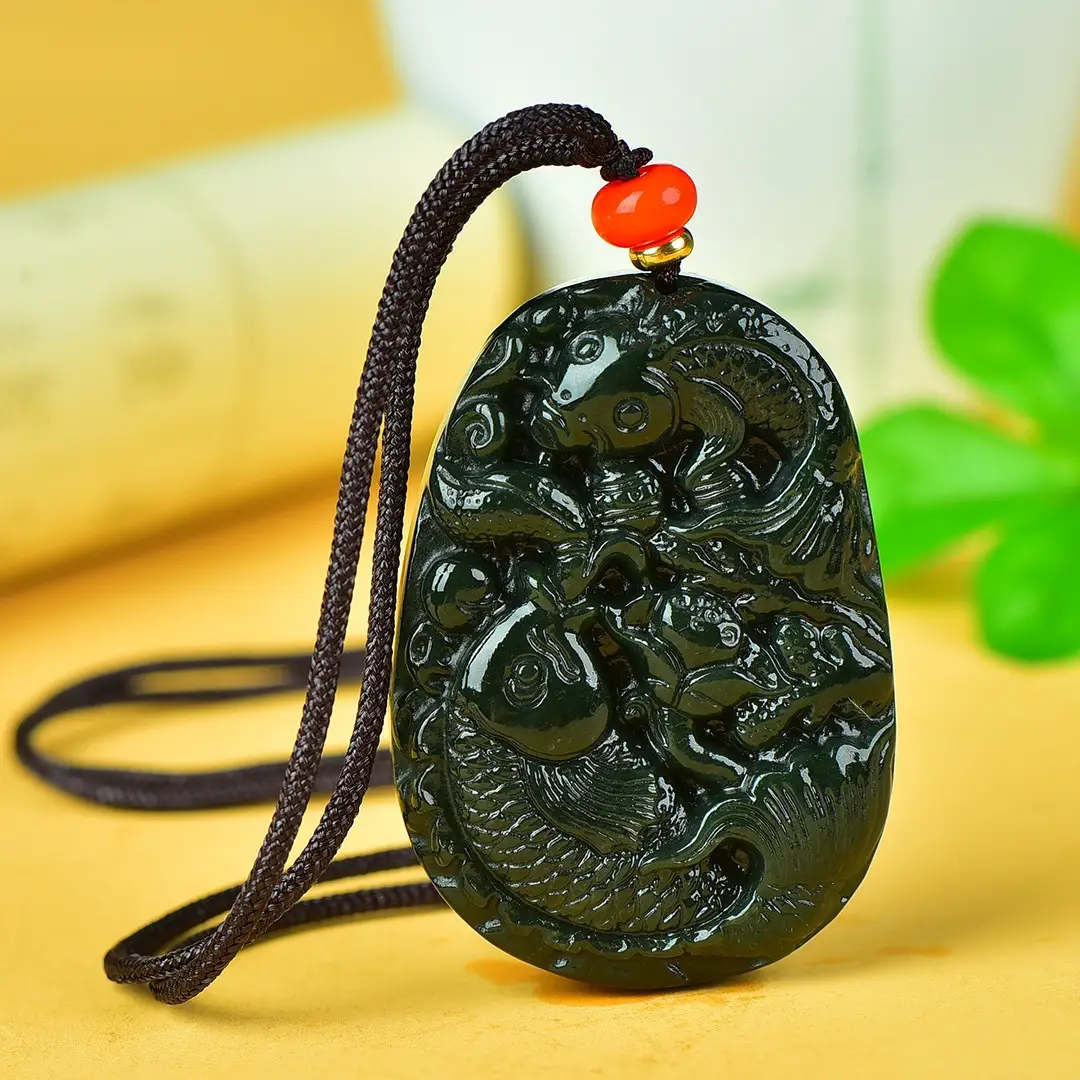 Jade Fish Pendant with Red Charm — feature 7