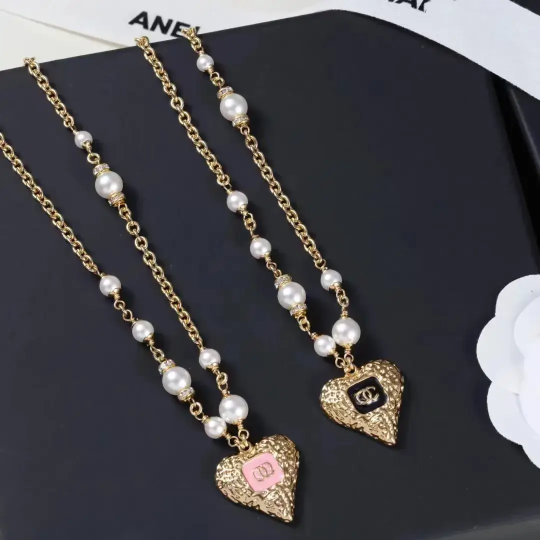 Chanel Heart Pearl Earrings Gold 23K