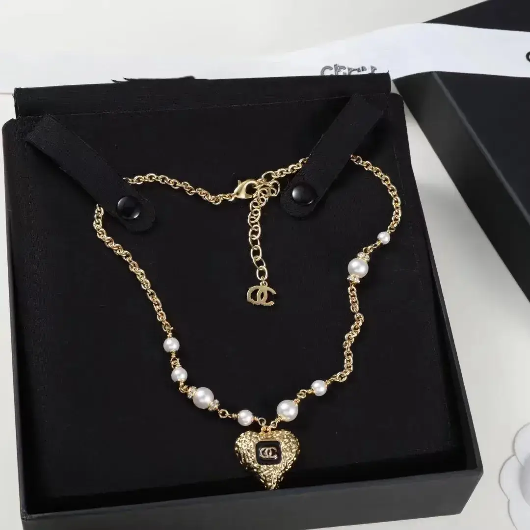 Chanel Heart Pearl Earrings Gold 23K