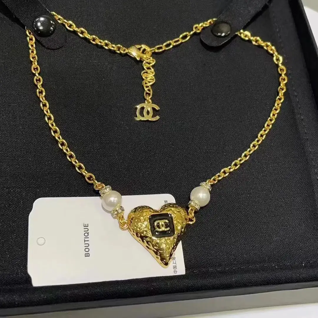 Chanel Heart Pearl Earrings Gold 23K