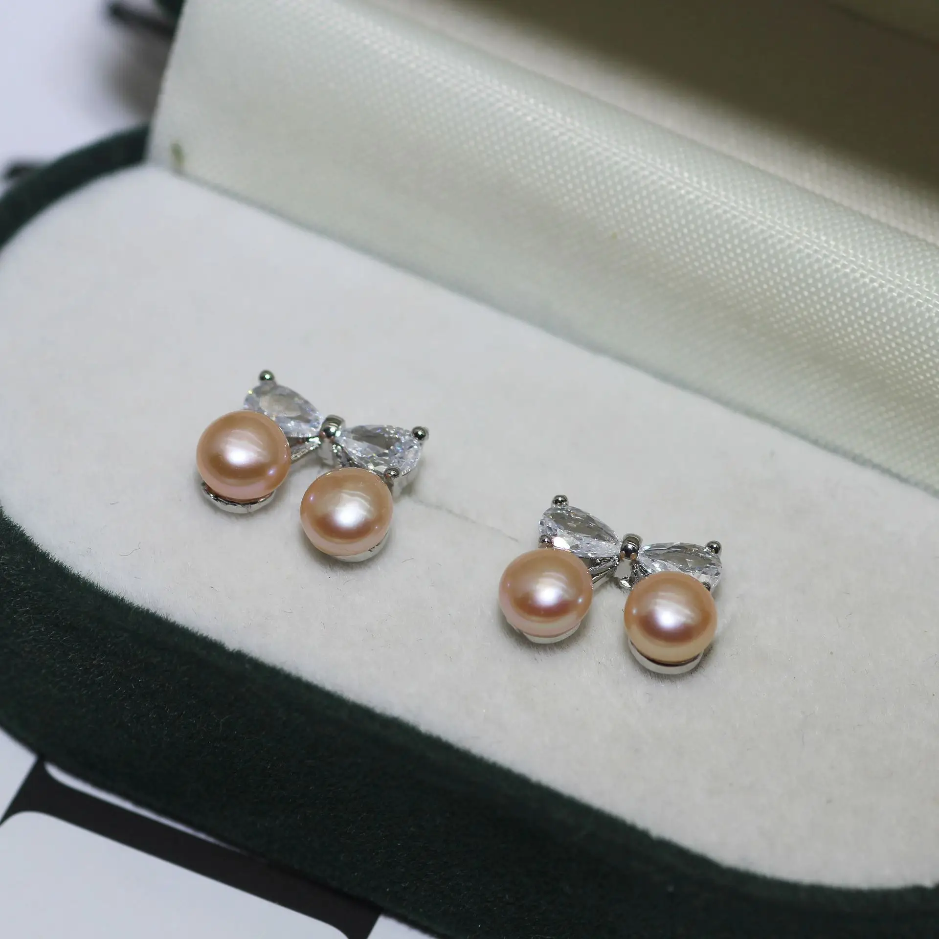 S925 Silver Bow Earrings with Pearl Accents — feature 3