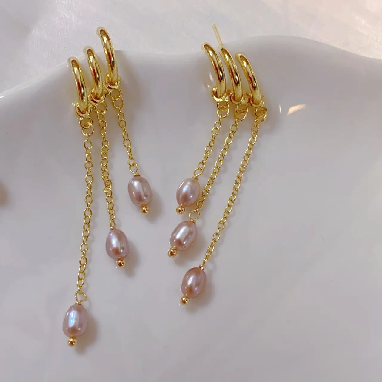 Long Silver Needle Earrings with Lavender Pearl Design