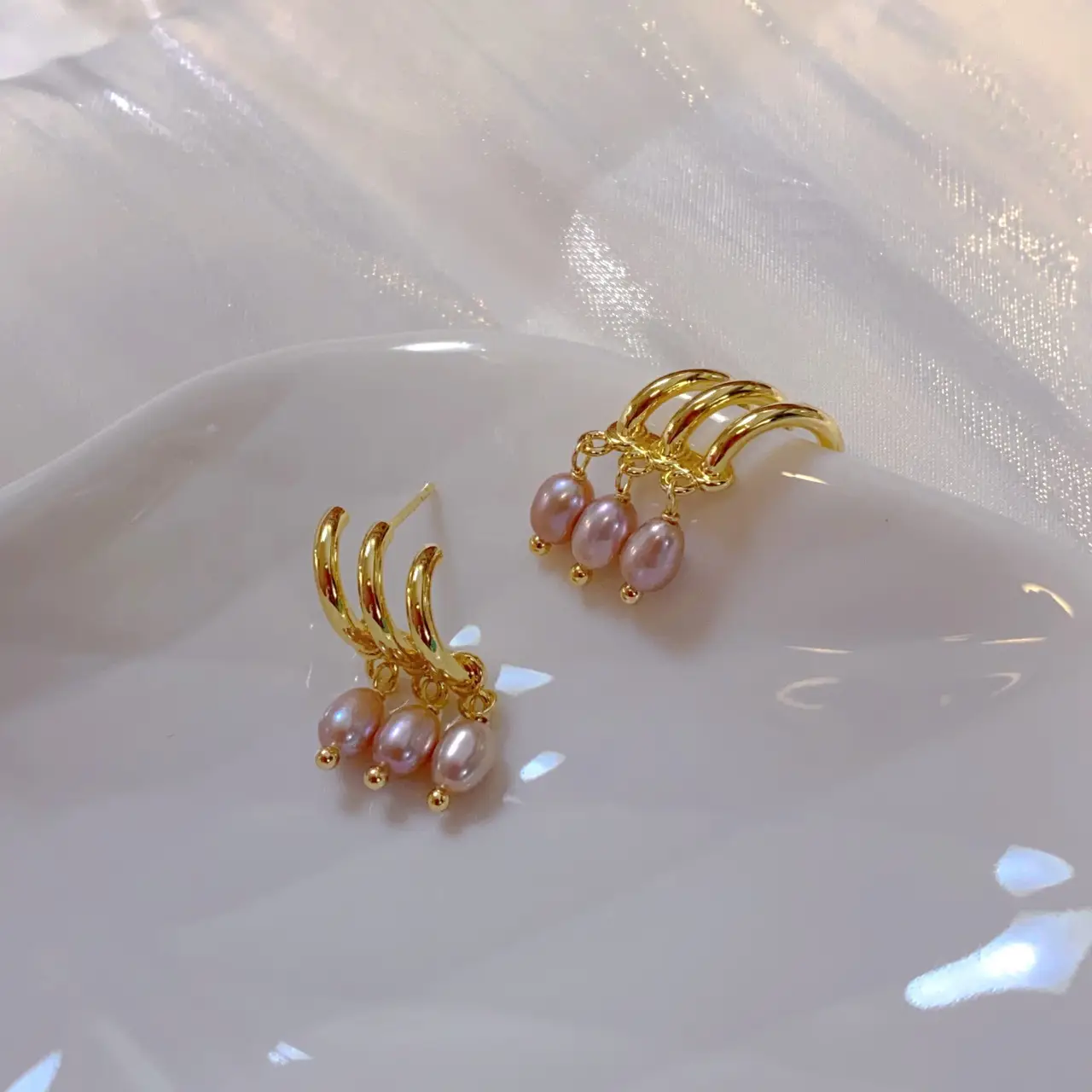 Long Silver Needle Earrings with Lavender Pearl Design