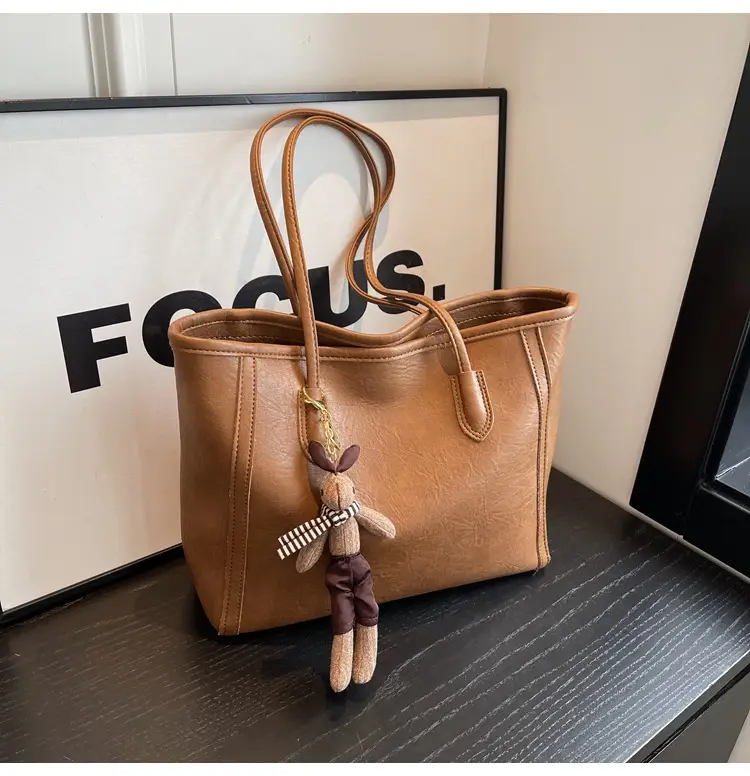 Women's Black Leather Shoulder Bag with Keychain — feature 24