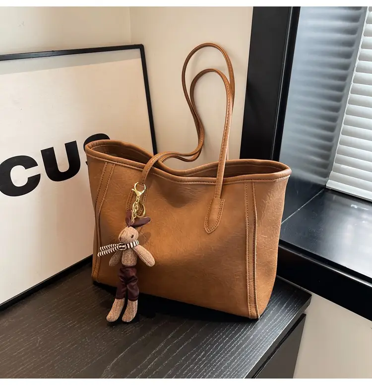 Women's Black Leather Shoulder Bag with Keychain — feature 25