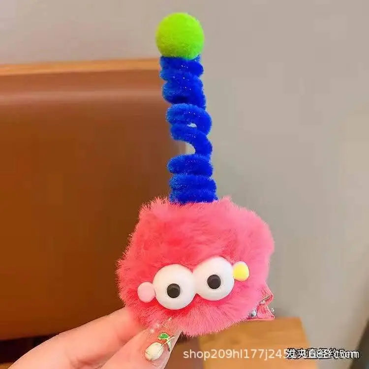 Pink Plush Hairpin with Blue Pom Pom