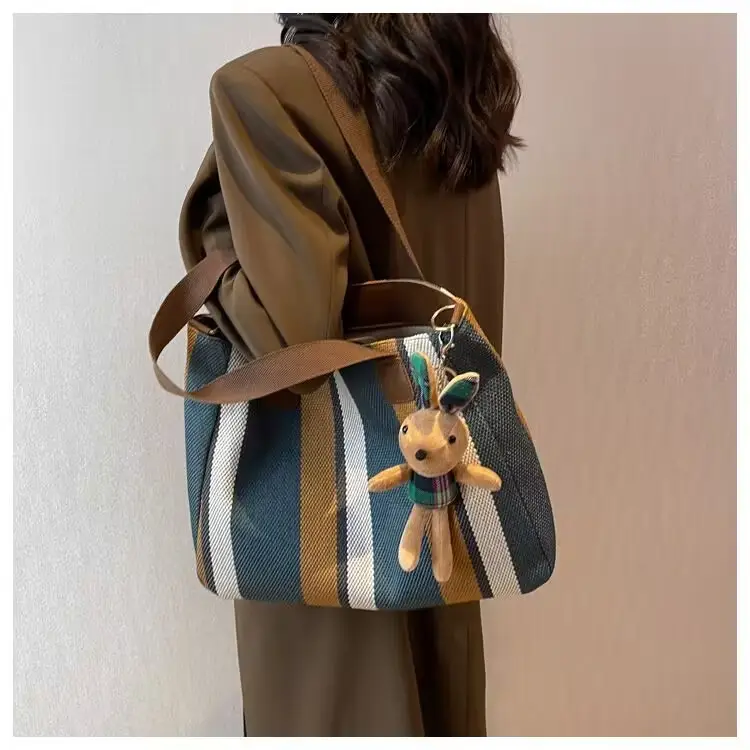 2025 New Trendy Multi-Layer Canvas Shoulder Bag with Bunny Keychain — feature 14
