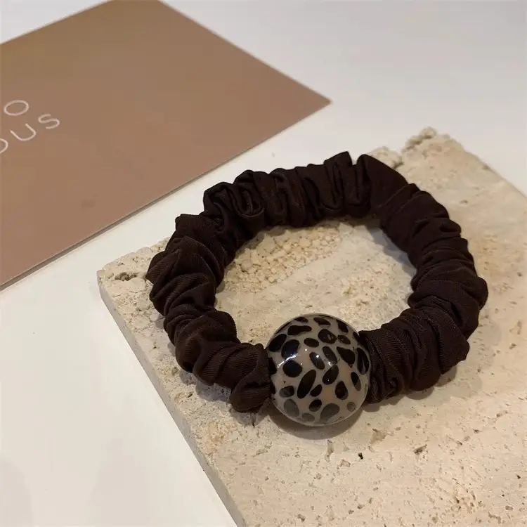 Brown Pearl Hair Band with Elastic Wrap — feature 5