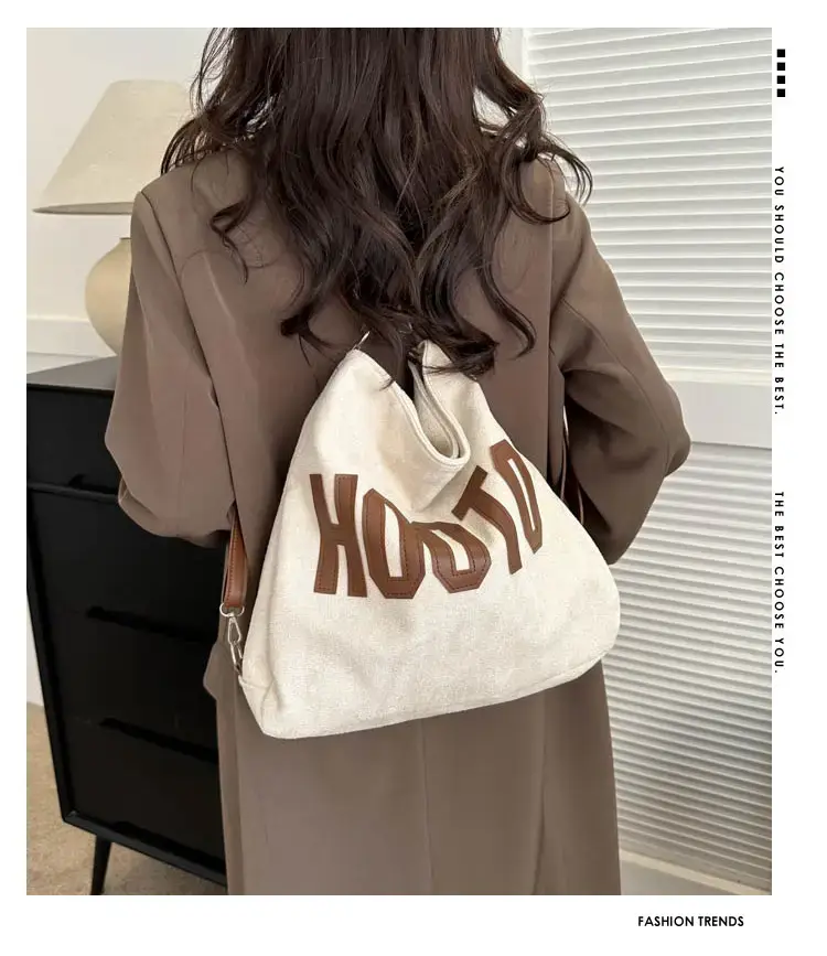 Textured Canvas Shoulder Bag Black White 2023 — feature 1