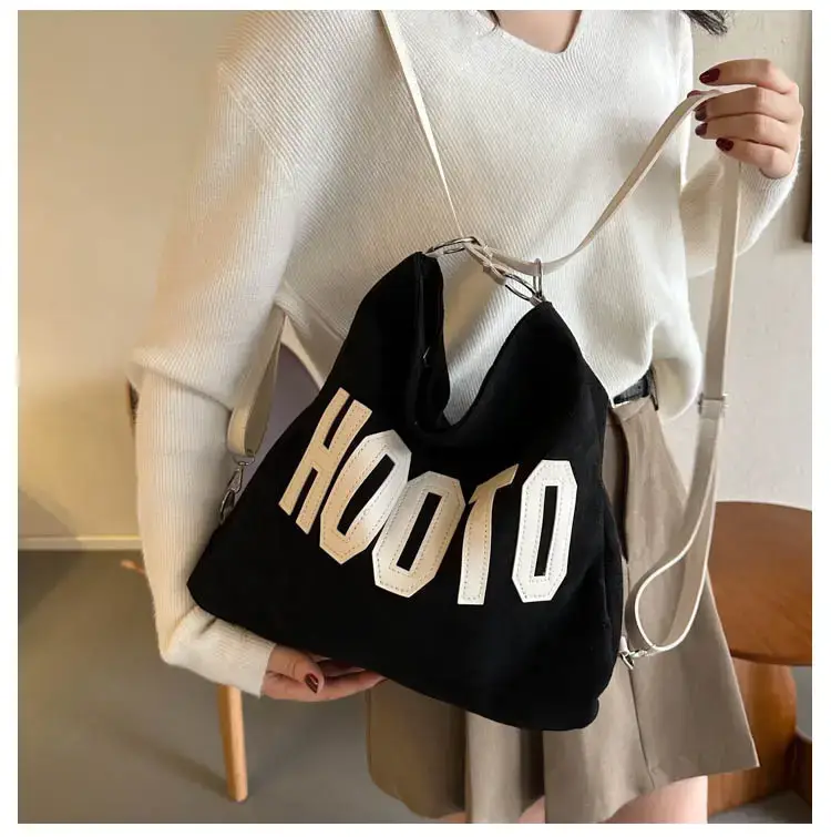 Textured Canvas Shoulder Bag Black White 2023 — feature 11