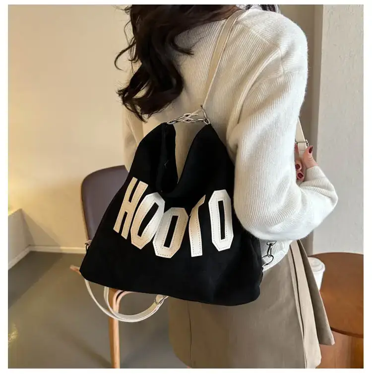 Textured Canvas Shoulder Bag Black White 2023 — feature 13