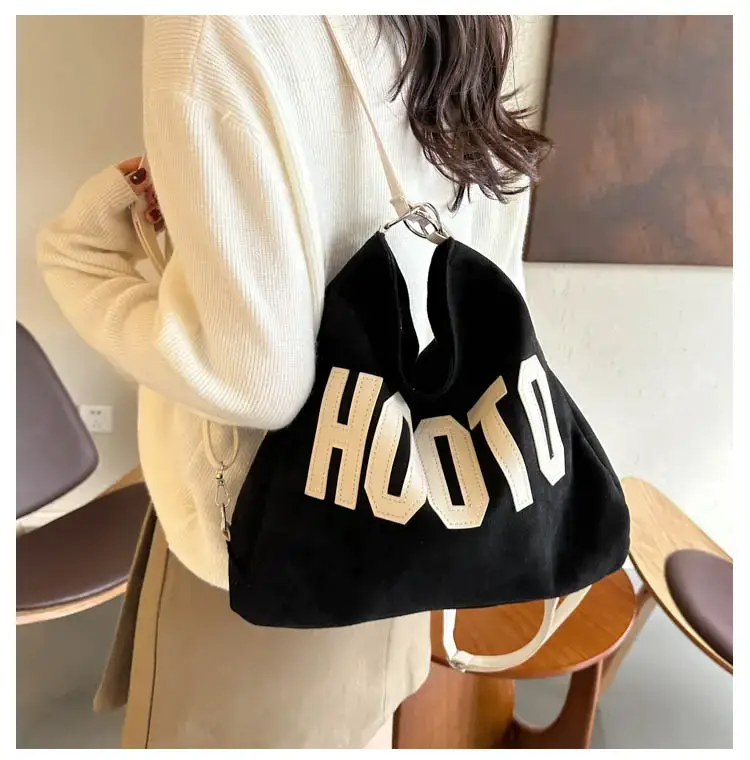 Textured Canvas Shoulder Bag Black White 2023 — feature 16