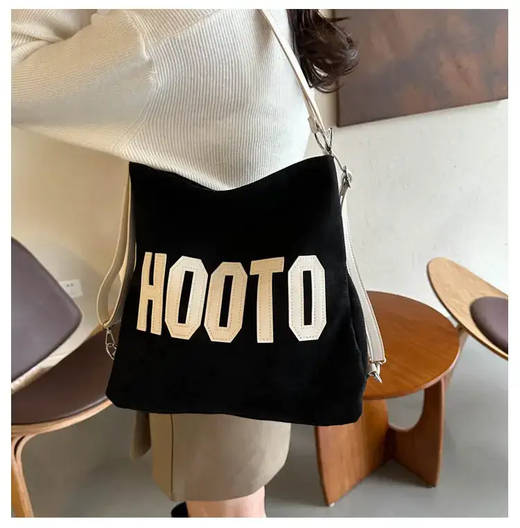 Textured Canvas Shoulder Bag Black White 2023 — feature 18
