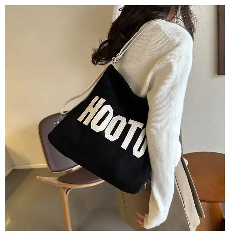 Textured Canvas Shoulder Bag Black White 2023 — feature 20