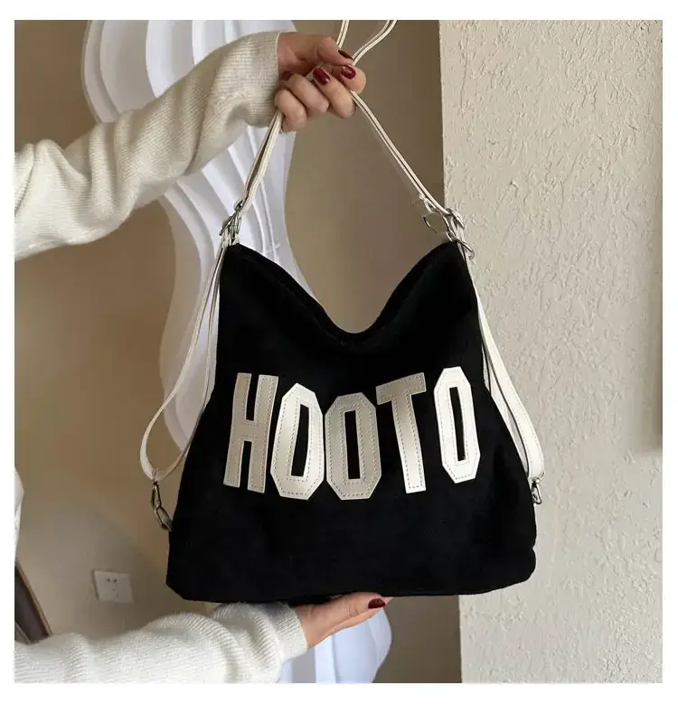 Textured Canvas Shoulder Bag Black White 2023 — feature 21