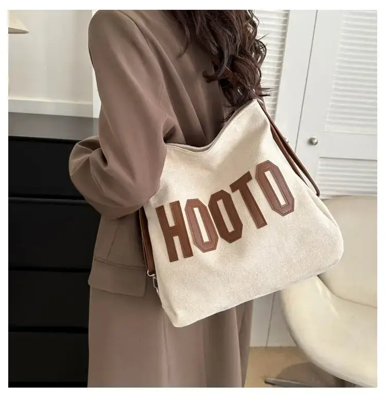 Textured Canvas Shoulder Bag Black White 2023 — feature 22