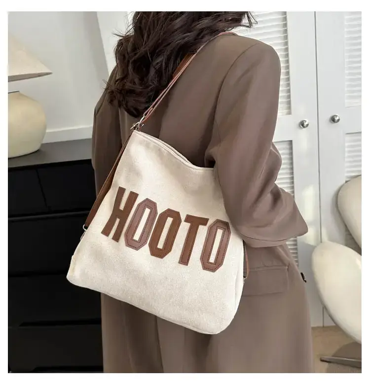 Textured Canvas Shoulder Bag Black White 2023 — feature 23