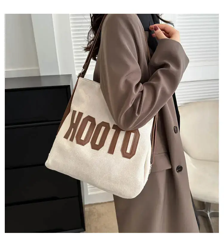 Textured Canvas Shoulder Bag Black White 2023 — feature 24