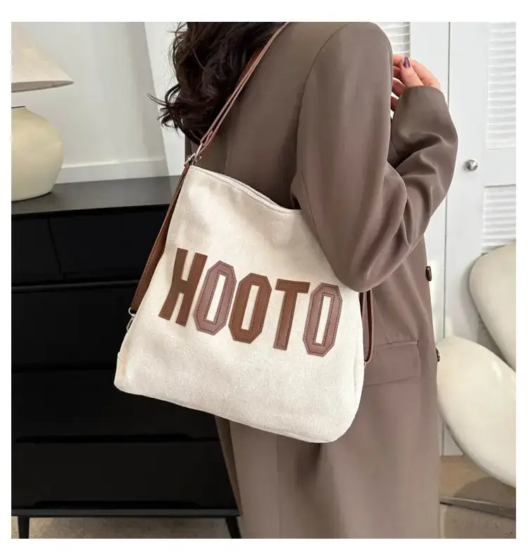 Textured Canvas Shoulder Bag Black White 2023 — feature 25