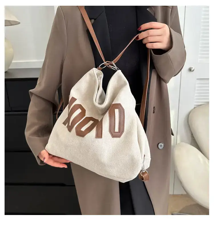 Textured Canvas Shoulder Bag Black White 2023 — feature 26