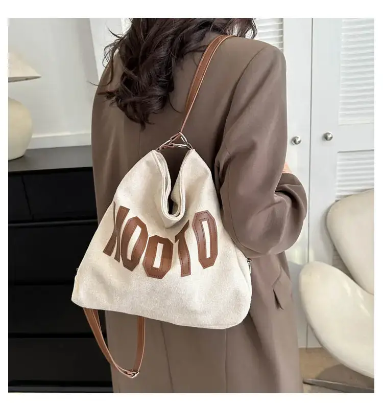 Textured Canvas Shoulder Bag Black White 2023 — feature 27