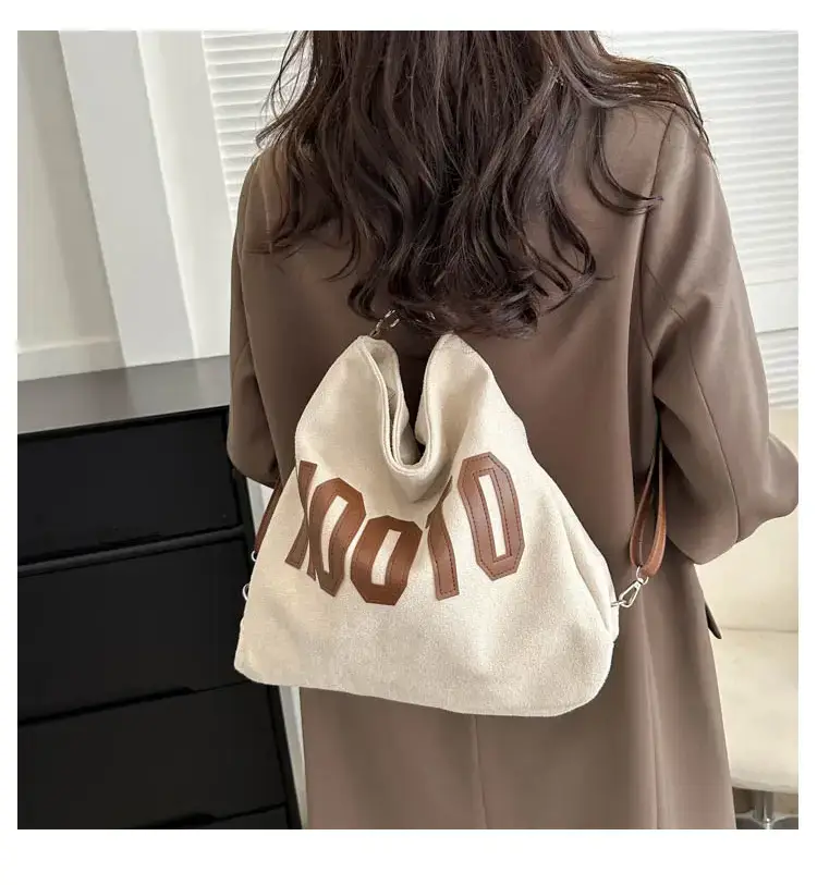 Textured Canvas Shoulder Bag Black White 2023 — feature 28