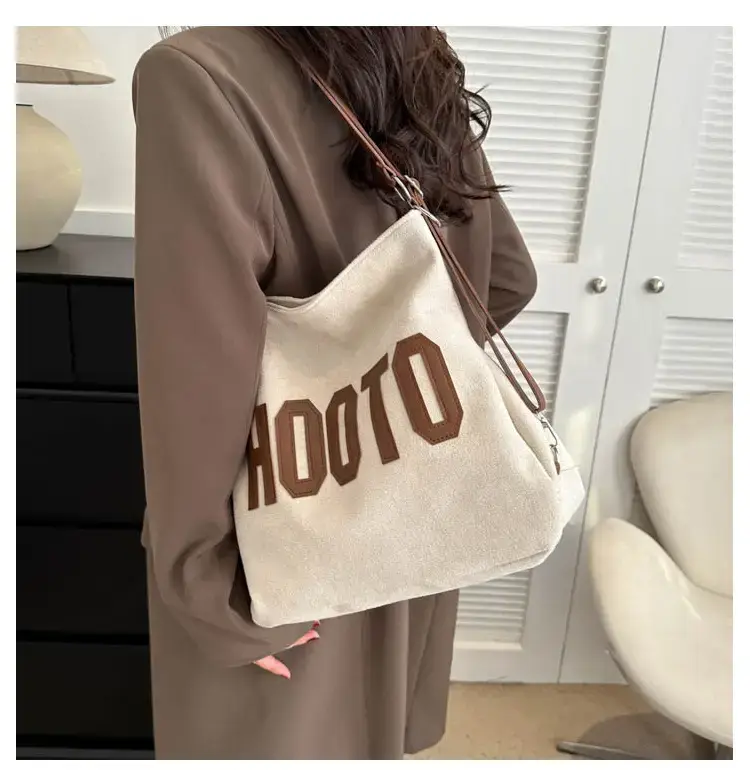 Textured Canvas Shoulder Bag Black White 2023 — feature 29