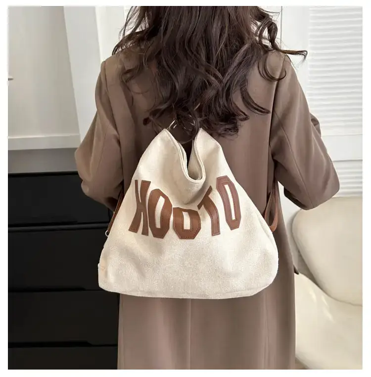 Textured Canvas Shoulder Bag Black White 2023 — feature 31