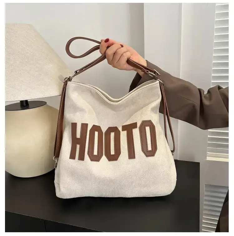 Textured Canvas Shoulder Bag Black White 2023 — feature 32