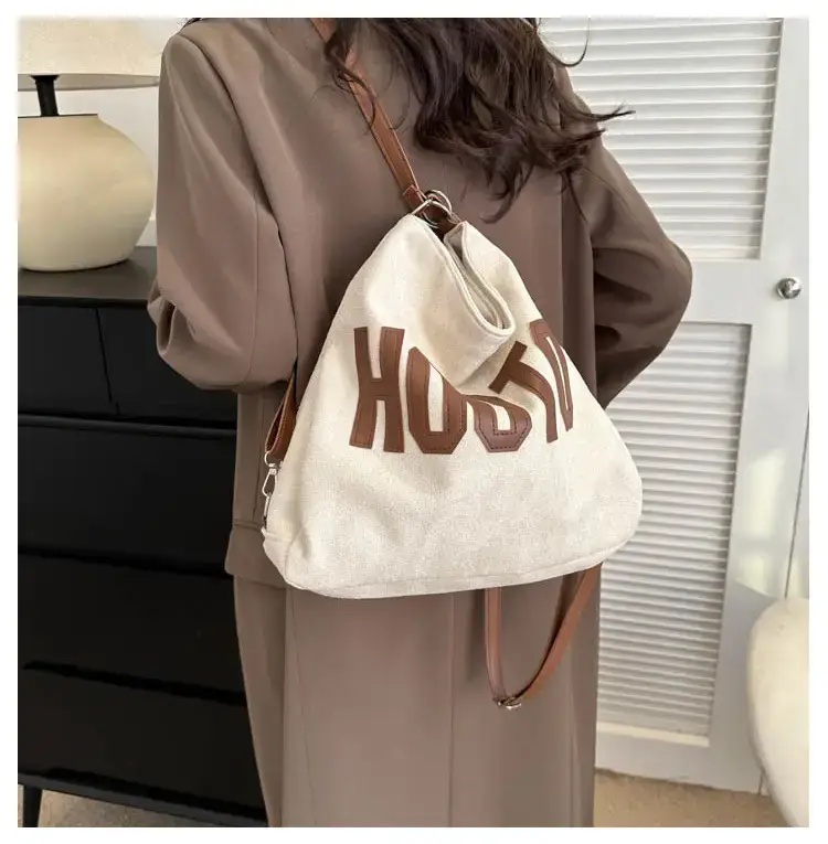 Textured Canvas Shoulder Bag Black White 2023 — feature 33